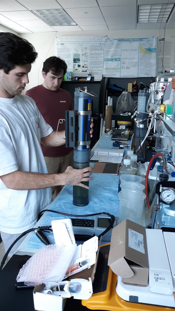 Ian and Nate calibrating sensors on a lab bench